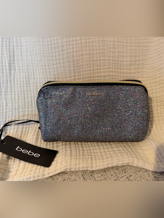 bebe Handbags - Bebe Iridescent Glitter Cosmetic Pouch - Silver NWT.